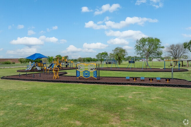 The Four Corner Community Center Park offers a space for families to gather and have fun.
