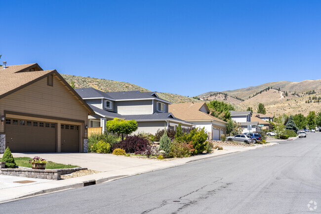 The homes of Northgate sit on stepped foundations leading to the peaks of Peavine Mountain.