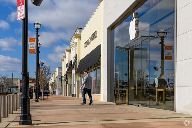 The Apple Store at Eastwood Towne Center is always busy, in Northside Lansing.