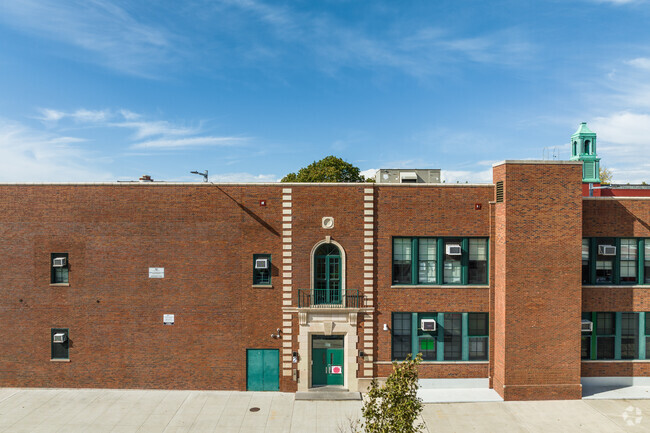 Palmer Elementary School features a brick architecture with green accents.