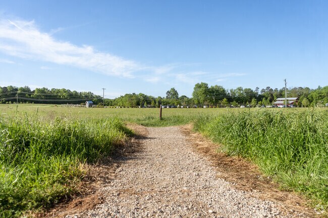 A gravel walking path at Clarks Creek Preserve in Davis Lake - Eastfield.