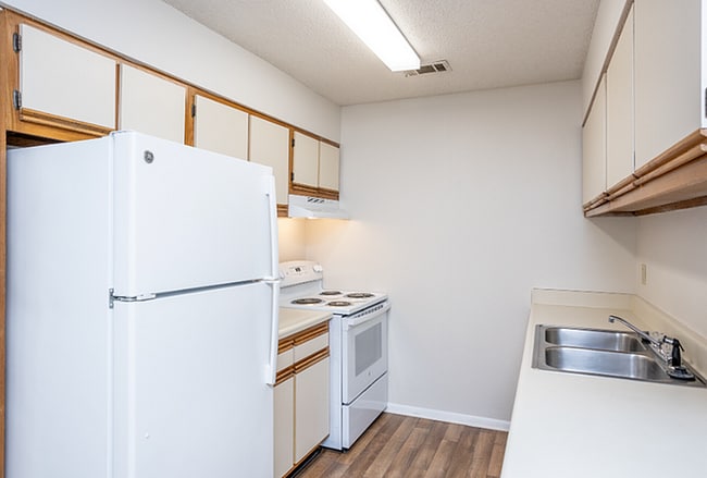 Step into a cozy kitchen that combines functionality with elegance.