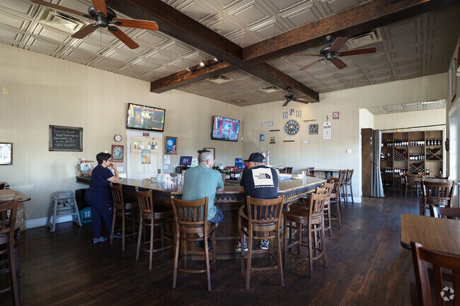 Customers beer sampling at Broadway Pizza Bar in the Columbia area.