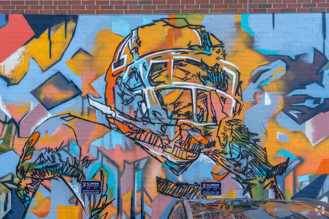 A large building murals can be found on the sides of buildings near the King Park in Urbana.