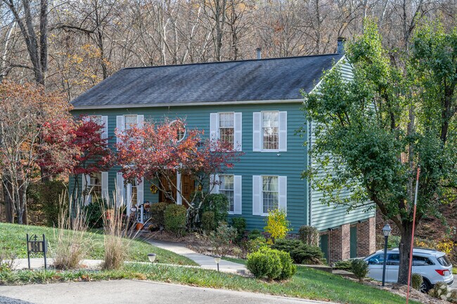 South Hills has many beautiful homes with driveways that drop down off the street.