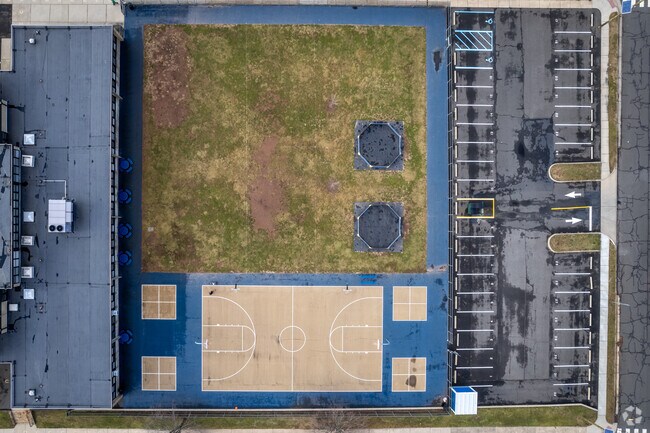 Roosevelt School's outside area and sports courts, as seen from above in Manville, NJ.