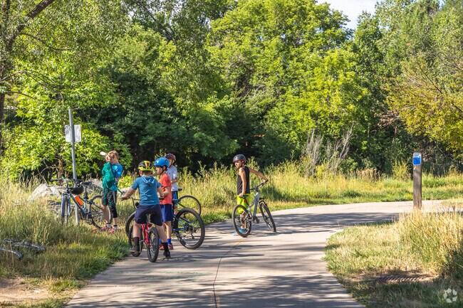 Kids love playing along the creekside of Spring Creek Trail.