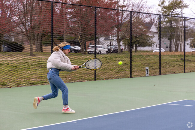 Oakhurst residents enjoy tennis at the Township of Ocean's West Park Recreational Center.