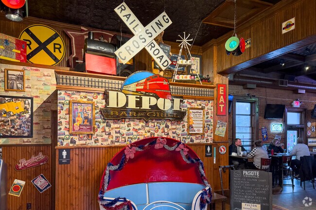 The Depot Bar and Grill is located next to an active train line.