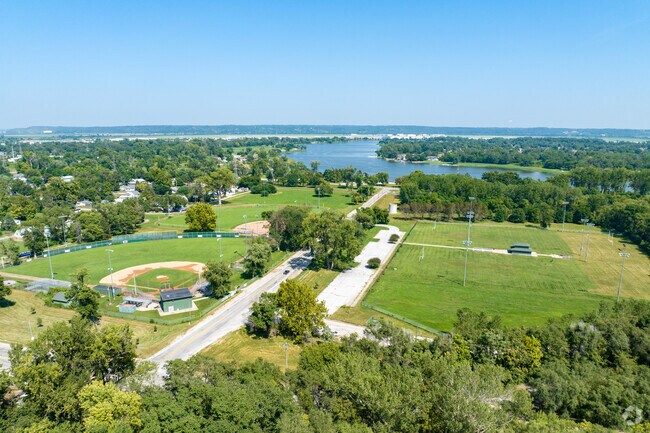 Levi Carter Park north of E R Danner includes fields, courts, and playgrounds.