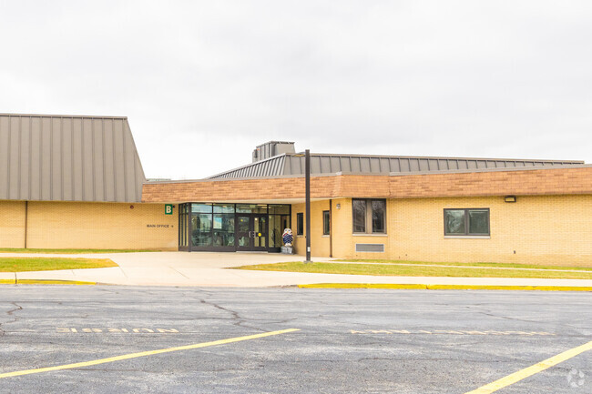 Allen J Warren Elementary School features a yellow brick design.