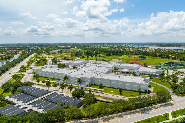 Aerial overview of Everglades High School inside Lakes Of Western Pines.