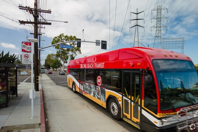 A transit bus departs from an Arlington stop, showcasing Southern California's mobility.