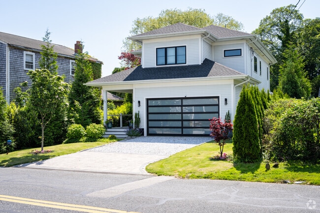 Newly renovated modern home styles create a distinct fresh look in Easton Pond, RI.