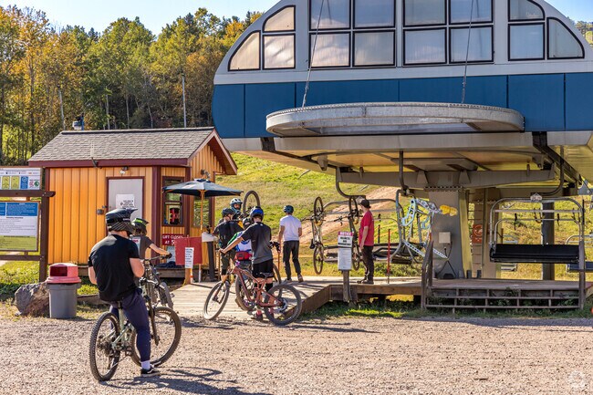 Head to the chairlift to go back to the top of the ski hill for another run.