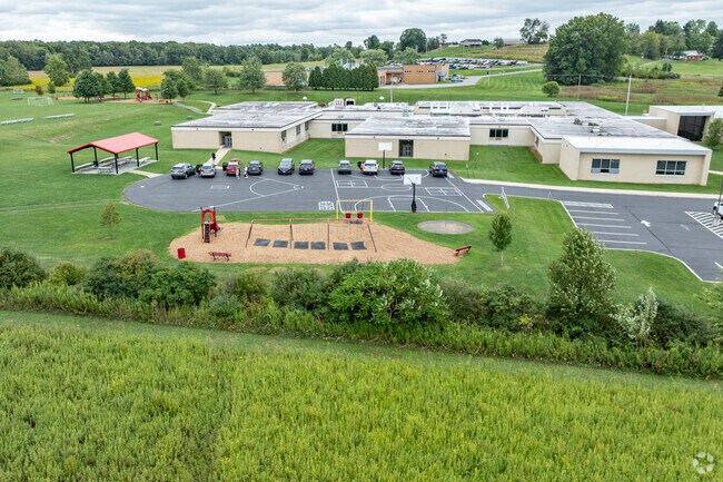 Conemaugh Township Area Elementary School has multiple playgrounds for kids.