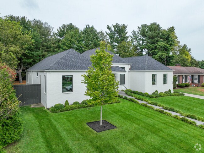 A beautiful yard adorns this custom home in Shriners