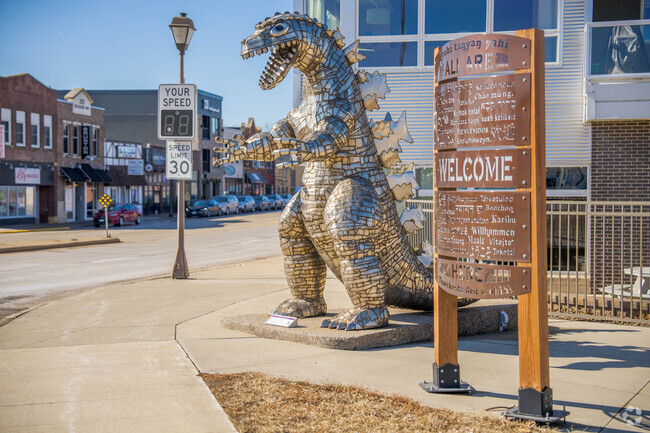 A Godzilla statue is on display near the entrance of North Mankato.