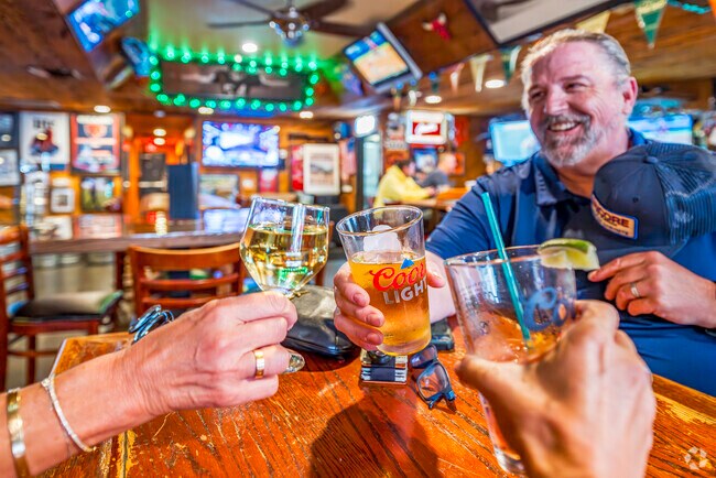 Patrons enjoy a drink at the friendly Glass Turtle in Meadow Oaks.