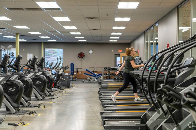 A person walks on a treadmill at the Claremont Community Center near the Maple Avenue District.