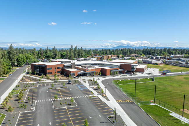 Sacajawea Middle School features large parking lot in front of the school.