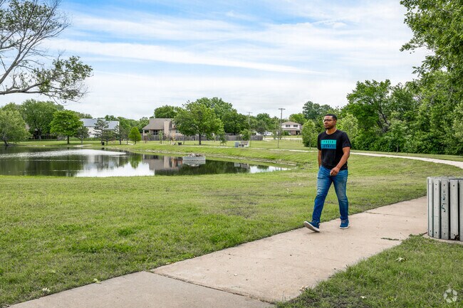Enjoy a stroll along the path at Eagle Lake in Bel Aire.