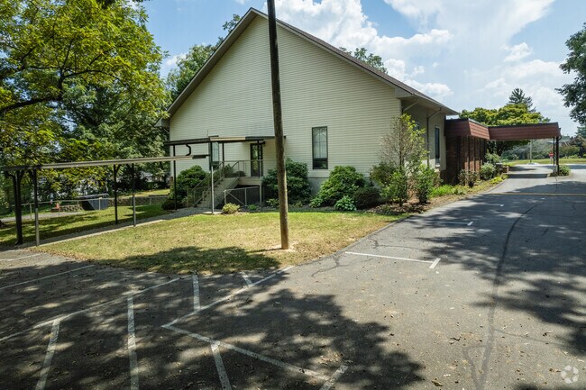 Upward Adventist School is located right next to a church.