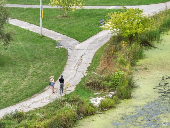 Locals take a stroll through Dineen Park.