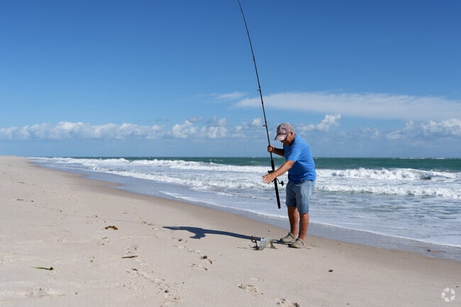Visitors are fishing off the beach of Avalon State Park near Florida Ridge.