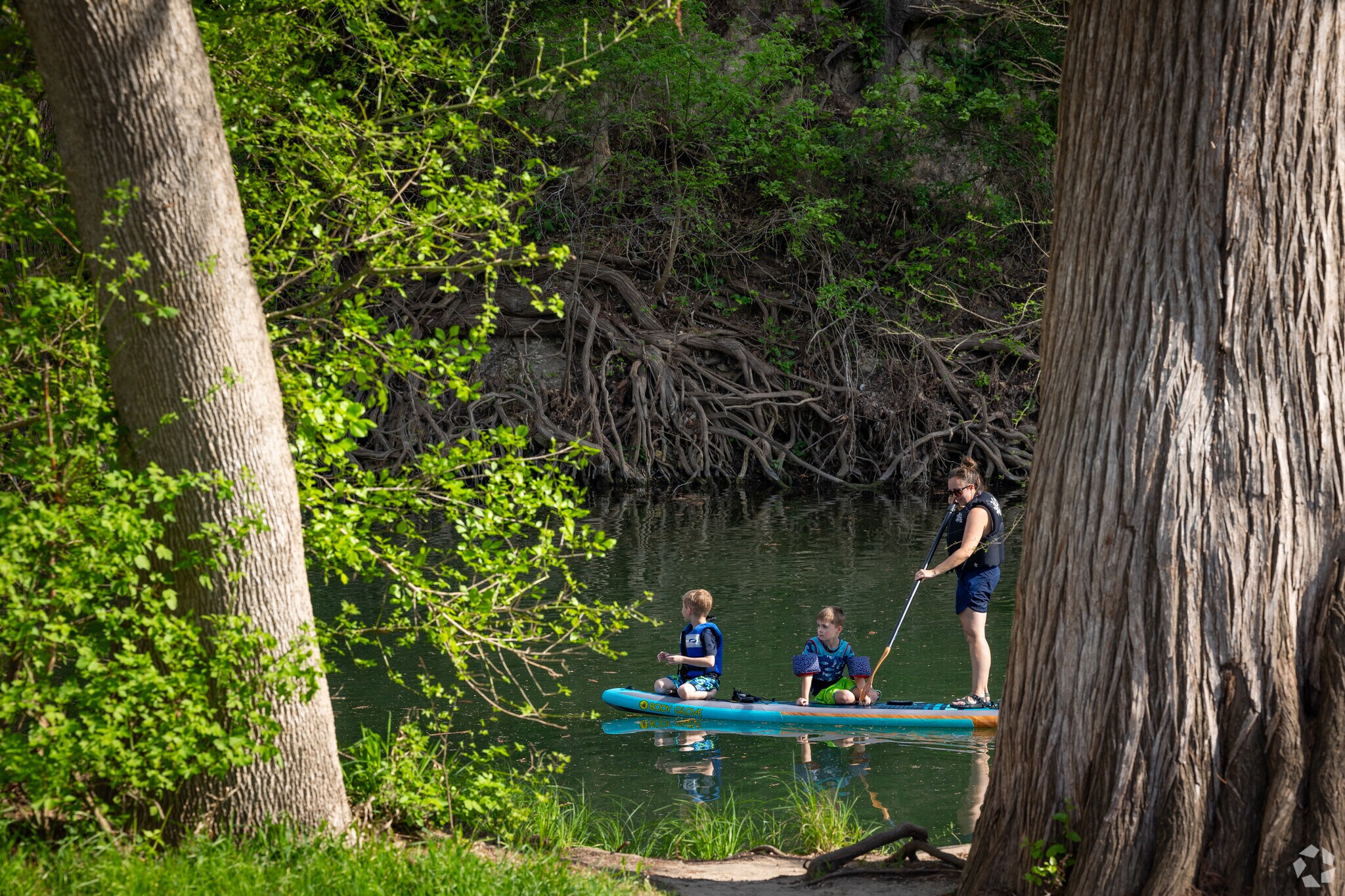 Residents can enjoy a paddle down the Comal River at Camp Comal Park.