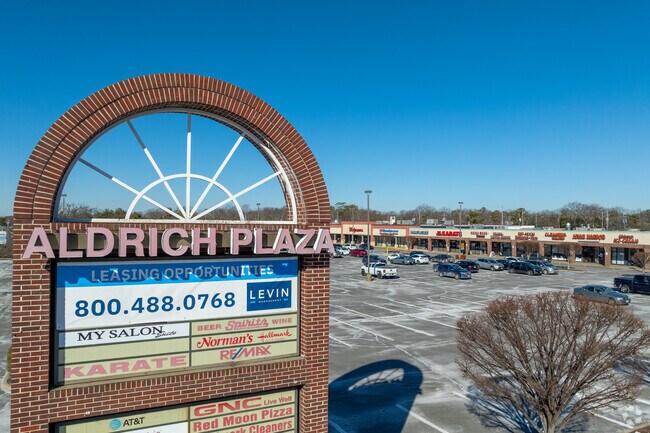 Many retail stores are concentrated around shopping centers on Route 9, including Aldrich Plaza.
