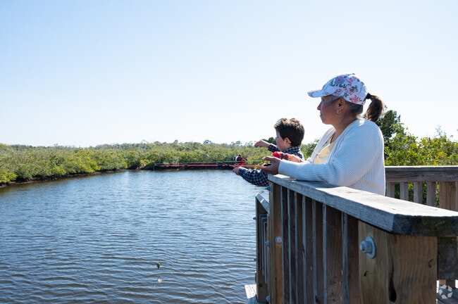 Families enjoy fishing off the docks at Eagle Point park.