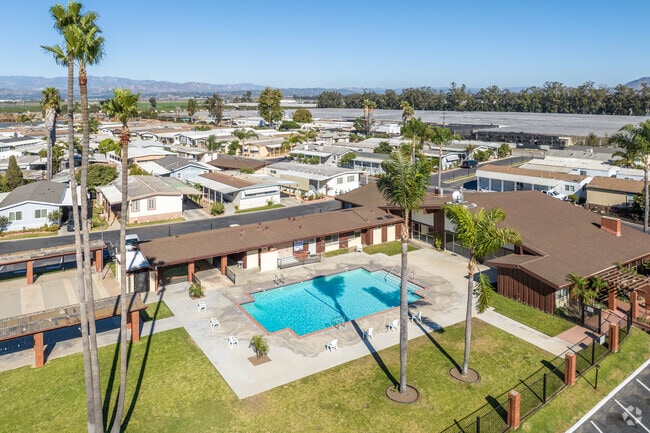 Oxnard Pacific has a large central clubhouse with a pool.