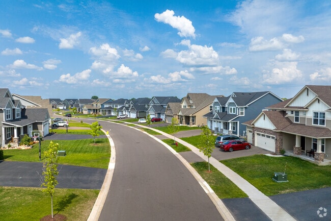 A streetscape of newly constructed homes in the Watermark development in Lino Lakes.