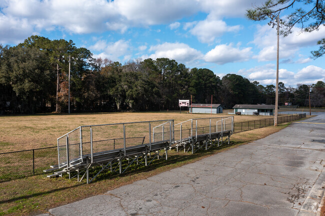 St. John Academy has stadium seating next to their large athletic field.