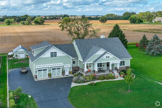 Large craftsman-style homes sit on lots throughout Kaneville.