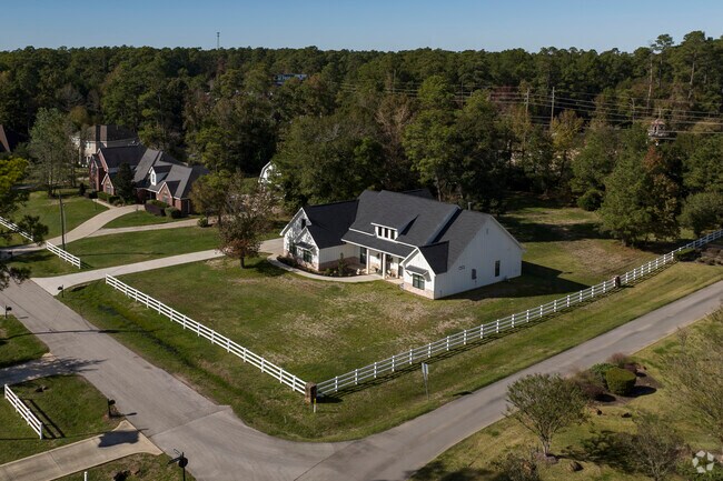 Homes sit on one acre lots in the gated Thousand Oak subdivision in Pinehurst.