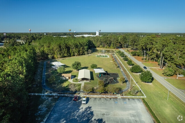 The Brooks-McCall Park is located next to a major roadway near Brookgreen Park.