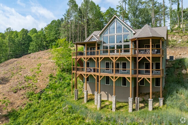 Custom homes in Vilas often feature timber frames and large windows to capture mountain views and natural light.