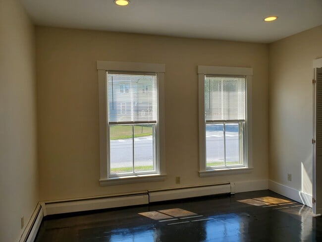 Bedroom with refinished floors