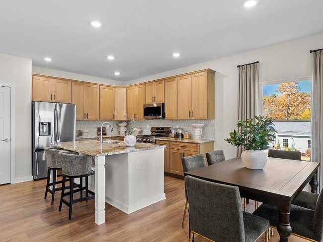 Smart home package, kitchen island, granite countertops, stainless steel appliances & LVP included!