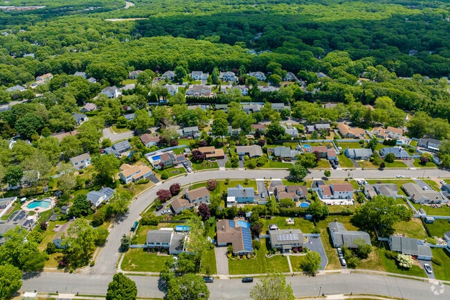 Lake Grove is a quiet, peaceful neighborhood known for its friendly atmosphere and suburban charm.