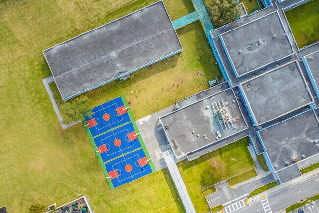 Students at Sweetwater Elementary School enjoy playing basketball at recess.