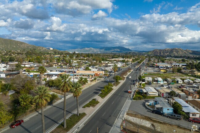 Mission blvd is lined with palm trees and mountain views of Rubidoux.