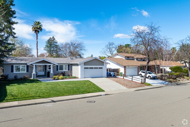 This beautifully updated Diablo Shadows home features modern curb appeal and a lush front lawn.