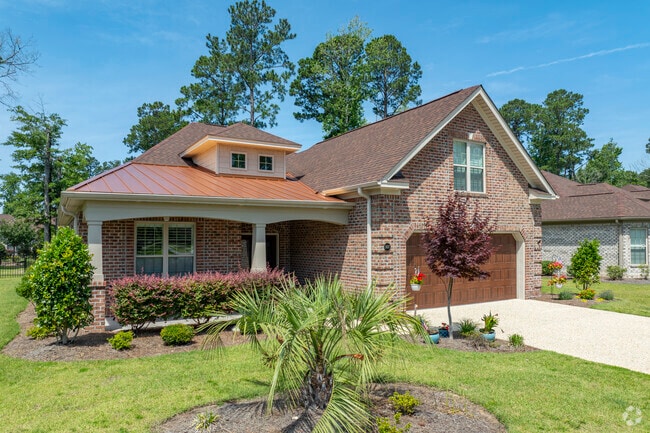 Skippers Corner homes range from elegant brick builds to cozy craftsman designs, offering character and variety.