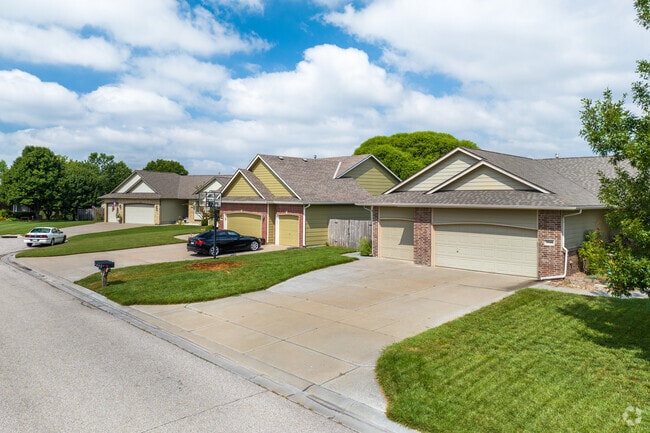 Many of the Avalon Park homes have red brick accent siding.