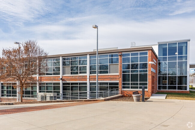 J.F. Kennedy High School boasts a contemporary design characterized by abundant glass elements.
