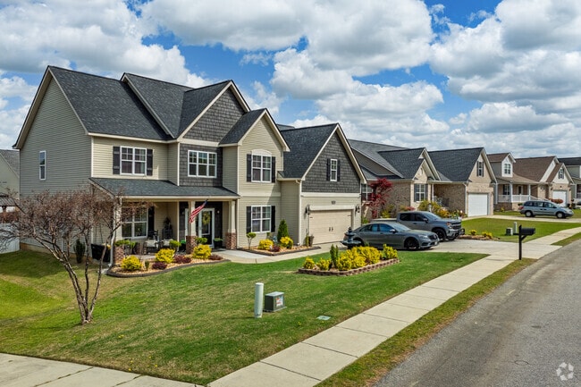 Most homes in Seventy-First boast multi-car garages, offering ample space for vehicle parking and storage.