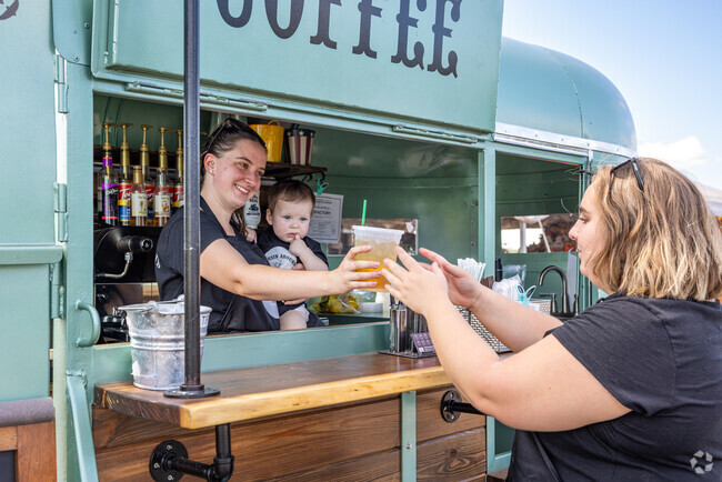 Horsin' Around Coffee serve their brews out of a vintage trailer at Norz Hill Farmers Market.